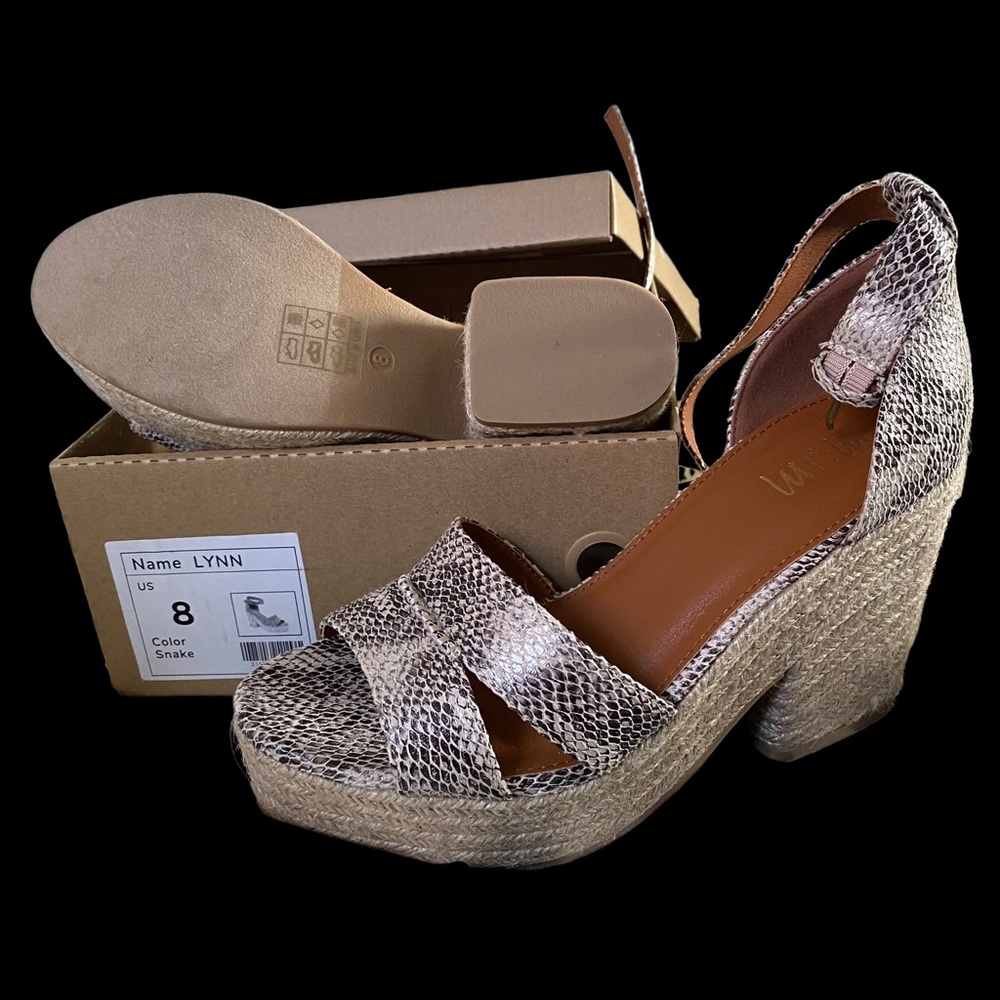 Miracle Miles Lynn Snake print platform sandals. New
